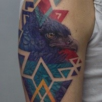 Geometrical style shoulder tattoo of various figures and eagle head