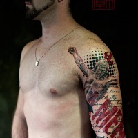 Glorious modern style colored shoulder tattoo of Jesus with lettering