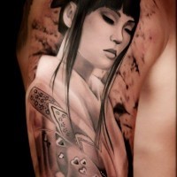 Glorious very detailed black and white shoulder tattoo of Asian woman in beautiful dress