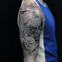 Gorgeous black ink realistic train shoulder tattoo with clock