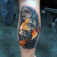 Tatuaje en la pierna, barco hermoso con bandera americana y la luna llena