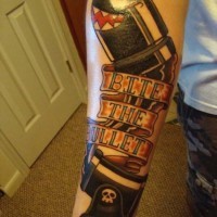 Gorgeous designed and colored massive bullet with lettering tattoo on arm