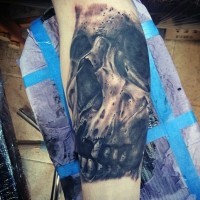 Gorgeous designed and detailed black and white old skull tattoo on arm