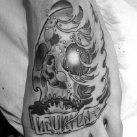 Gorgeous fantasy skull with lettering tattoo on foot