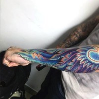Gorgeous multicolored very detailed wing tattoo on sleeve