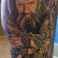 Gorgeous natural looking colored famous movie dwarf hero tattoo on leg