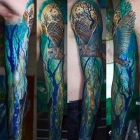 Gorgeous realism style large sleeve tattoo of owl flying in night forest