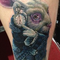 Gorgeous very detailed and colored thigh tattoo of rabbit from Alice in wonderland