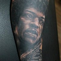 Gorgeous very detailed black and white forearm tattoo of famous singer