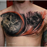 Gorgeous very detailed black and white owl tattoo on chest combined with human skull