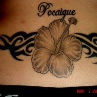 Gray hibiscus with tribal tracery tattoo