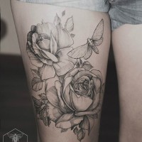 Gray ink roses and moths tattoo on thigh for women by diana severinenko