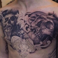 Gray washed style colored chest tattoo of human skull with smoking monster
