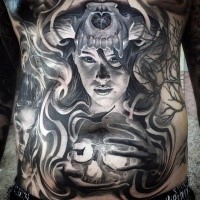 Gray washed style large mystical witch tattoo on belly with human skull