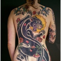 Great black panther and roses tattoo on whole back