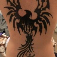 Great black tribal phoenix tattoo on whole back