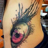 Great coloured eye tattoo on ribs