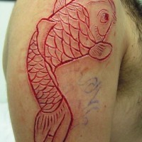 Great fish skin scarification on shoulder