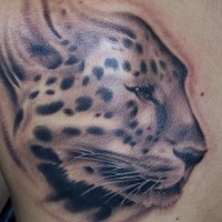 Great gray-ink cheetah head tattoo on back