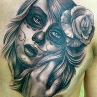 Great lovely santa muerte girl with rose in hair tattoo on chest