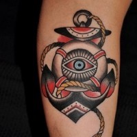Great old school anchor with eye in lifebuoy tattoo on shoulder