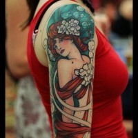 Great old school style colored beautiful woman with flowers tattoo on shoulder