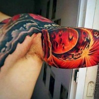 Great painted and colored big space tattoo on biceps
