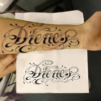 Great painted simple black ink lettering tattoo on arm