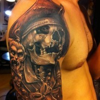 Great pirate skull tattoo on shoulder