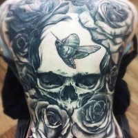 Great skull with butterflies and roses tattoo on whole back