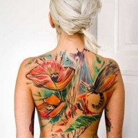 Great watercolor flowers with dragonfly tattoo on whole back