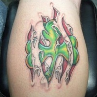 Green clover under skin rip tattoo