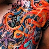 Great red octopus and starfish tattoo on chest