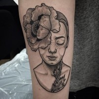 Grotesque lady's portrait with big poppy flower on head tattoo on forearm in original technique