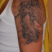 Guardian angel tattoo on shoulder