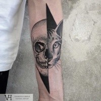Half geometrical half dot style forearm tattoo of split human skull with cat by Valentin Hirsch