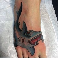 Hammer fish shark naturally colored cartoon like tattoo on foot