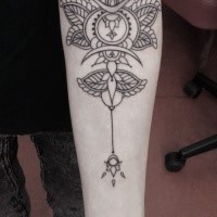 Hinduism style black ink arm tattoo of cool ornament