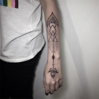 Hinduism style black ink arm tattoo of typical ornament