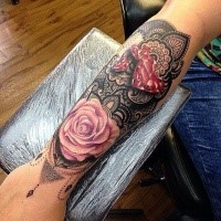 Hinduism style colored hand tattoo of rose with heart shaped diamonds