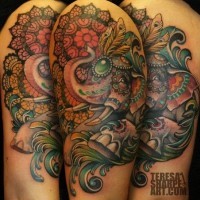 Hinduism themed colorful shoulder tattoo of big elephant and ornamental flowers
