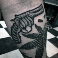 Homemade black ink leg tattoo of bone like revolver