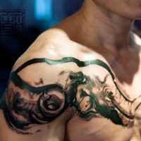 Homemade black ink shoulder tattoo of big elephant family