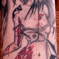 Homemade carelessly painted bloody woman tattoo on shoulder