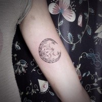 Homemade dot style black ink arm tattoo of mystical moon