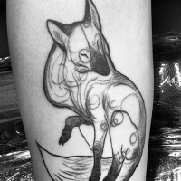 Homemade like black ink abstract fox pattern on forearm