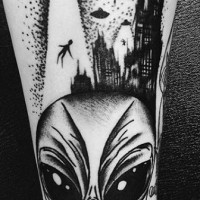 Homemade like black ink alien themed tattoo on leg