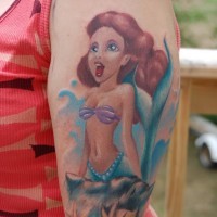 Homemade like colored beautiful mermaid tattoo on arm