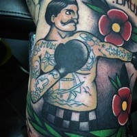 Homemade like colored vintage boxer with flowers tattoo on arm