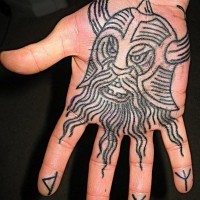 Homemade simple black ink carelessly painted hand tattoo of evil antic warrior
